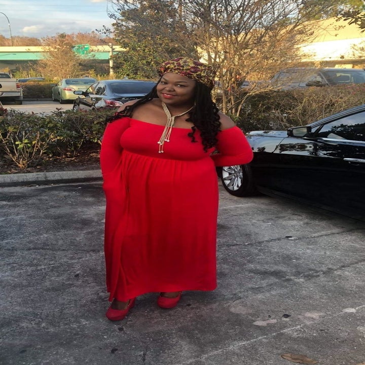 Reviewer wearing the dress in red