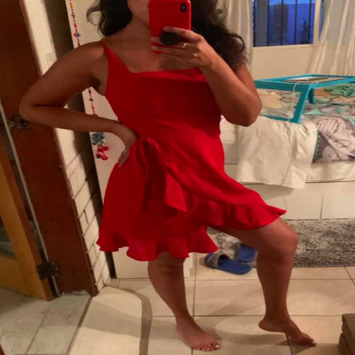 A customer review photo of them wearing the dress