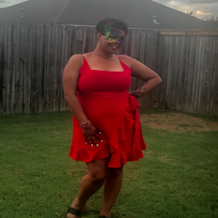 A customer review photo of them wearing the dress