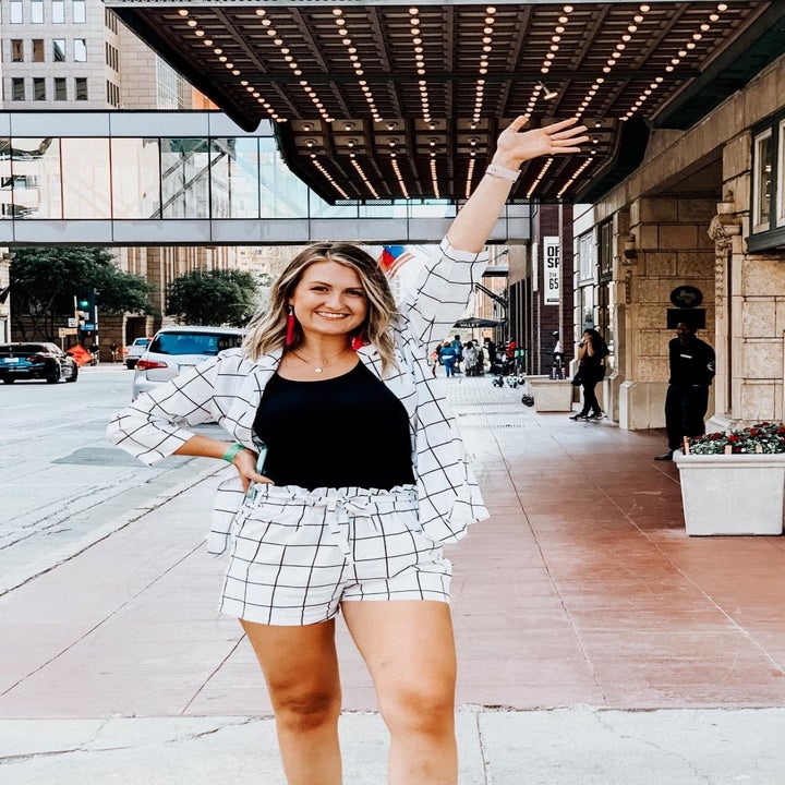 Reviewer wearing the set in white with black square pattern to it