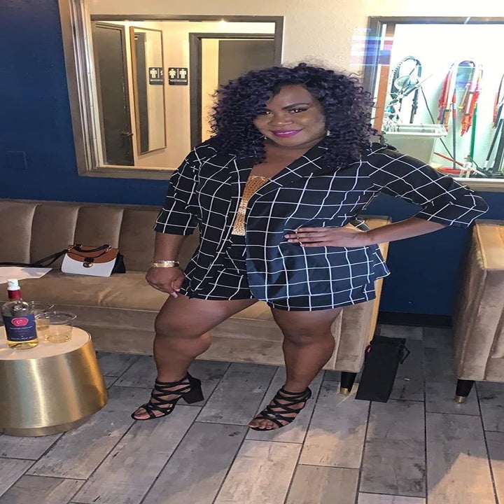 A different reviewer wearing the set in navy blue with white square pattern