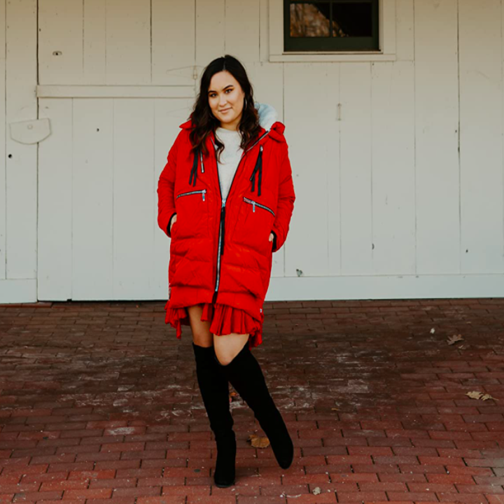 A customer review photo of them wearing the jacket in red
