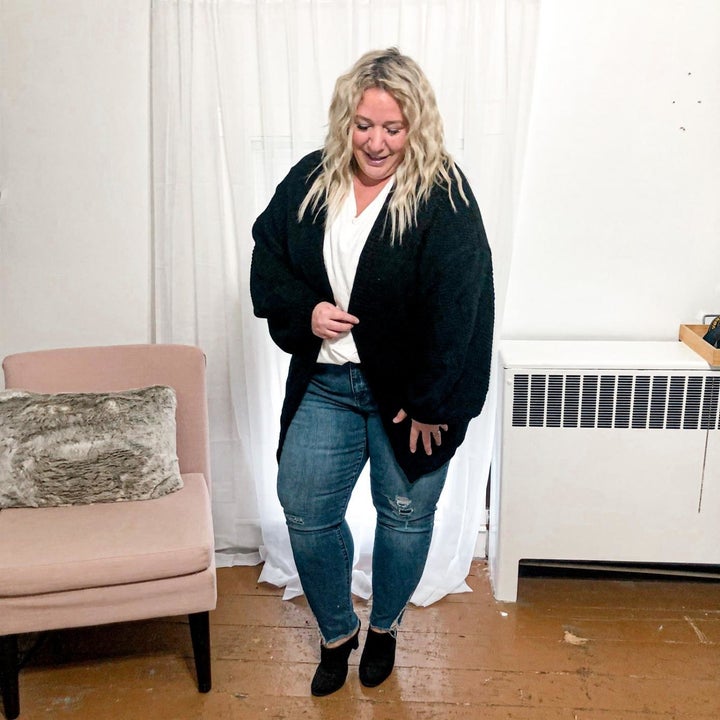 a different reviewer wearing the cardigan in black