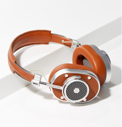 A pair of leather-bound over the headphones with a retro aesthetic