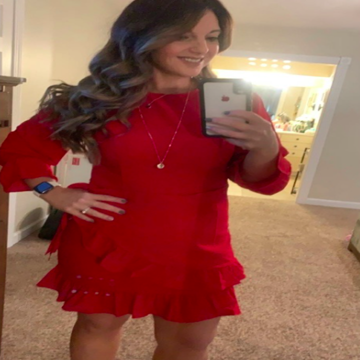 A customer review photo of them wearing the dress