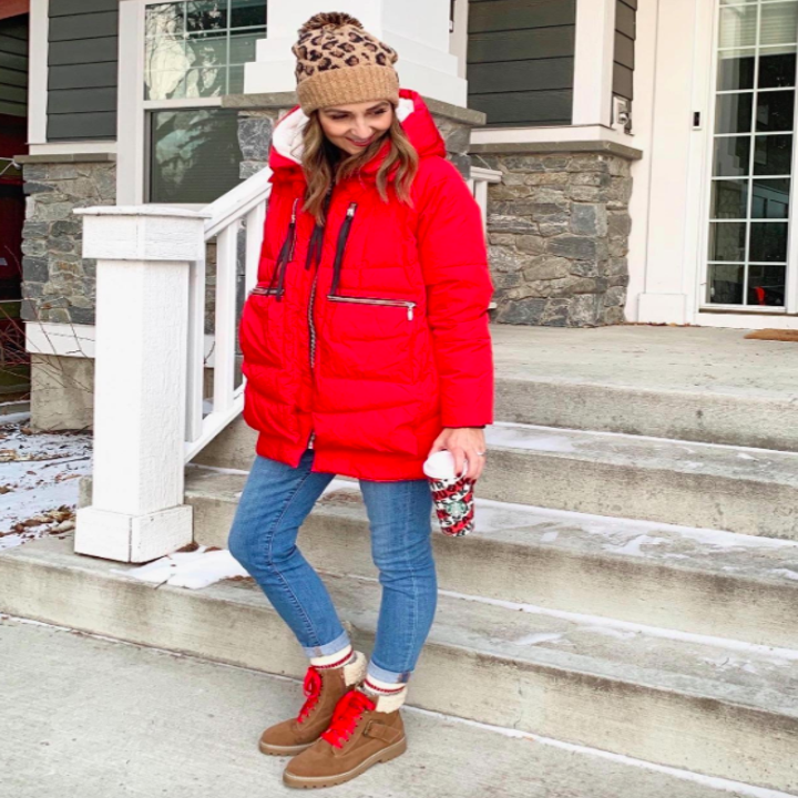 A customer review photo of them wearing the jacket in red