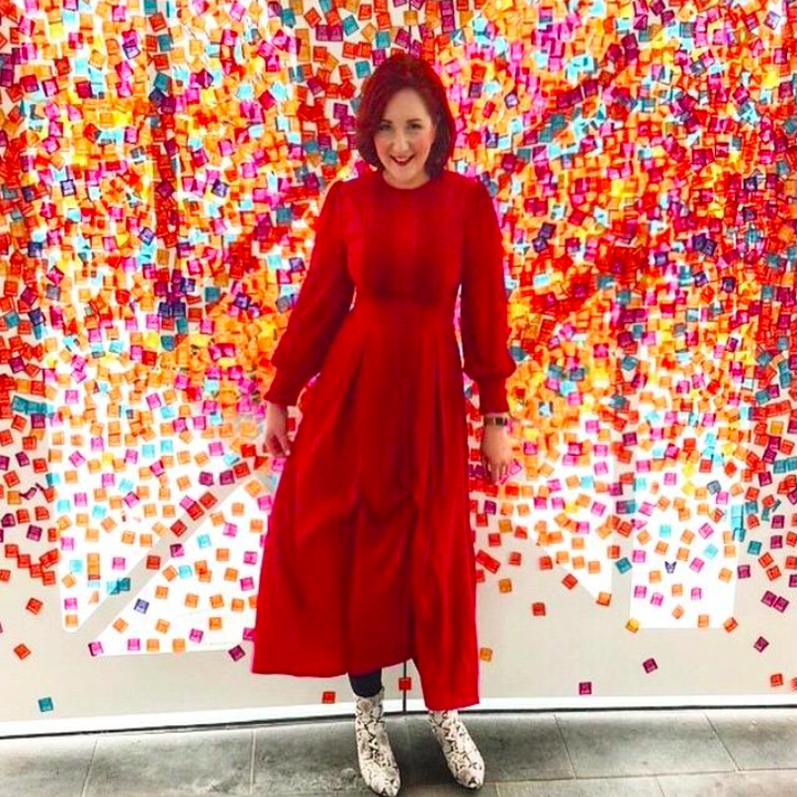 A customer review photo of them wearing the dress