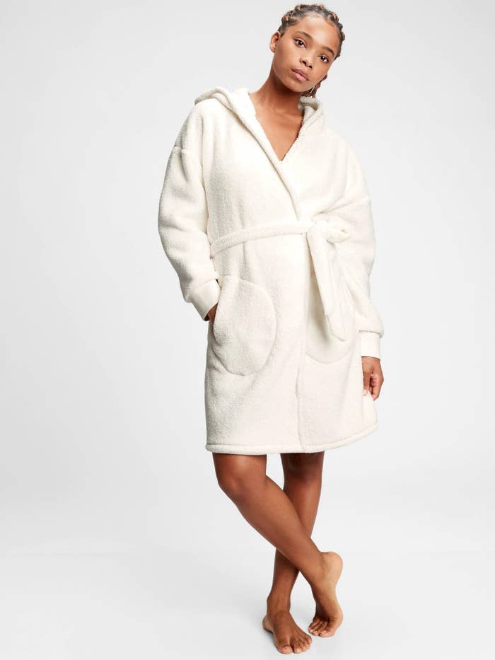 Model wearing robe