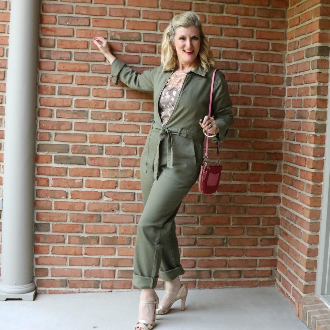 Reviewer wearing the long-sleeved and long pants jumpsuit in green