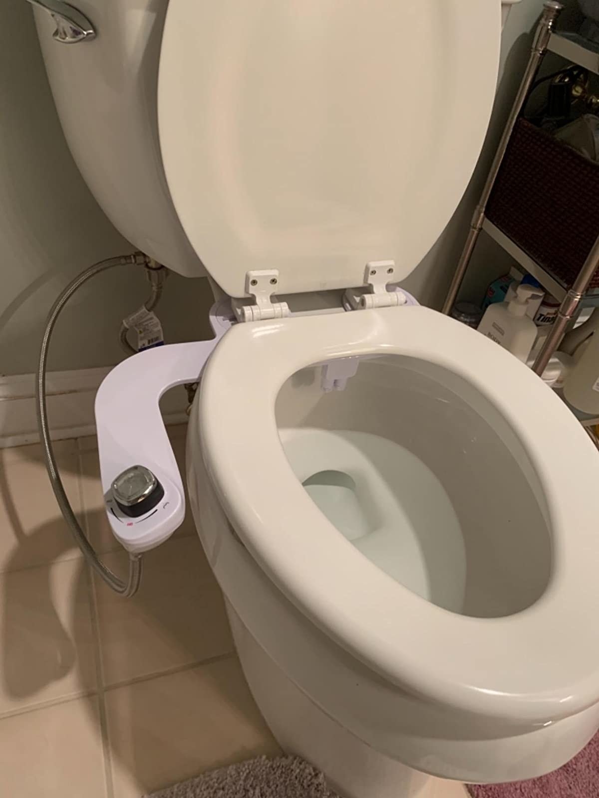 Reviewer photo of the bidet installed on their toilet