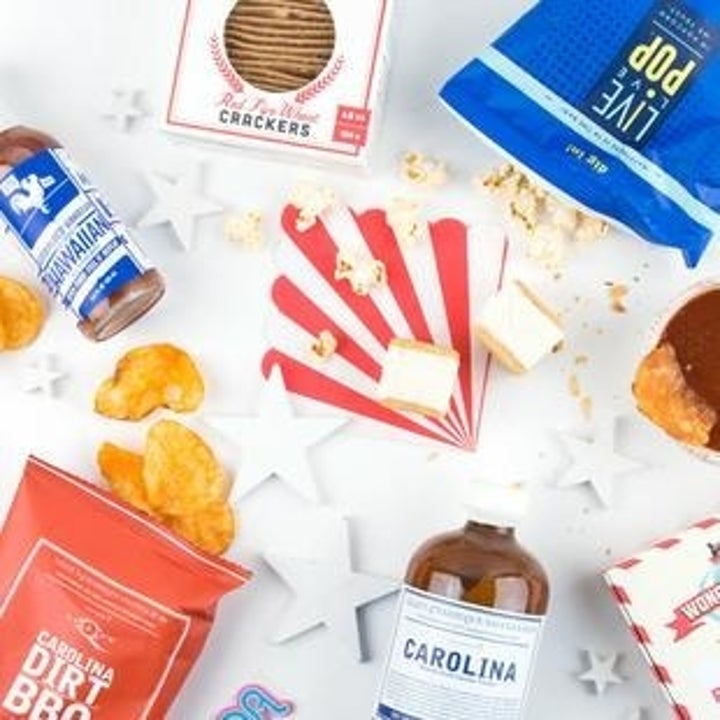A variety of blue, red, and white food products on a white background