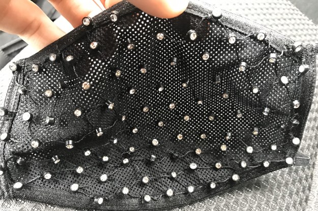 A face mask with tiny holes in it