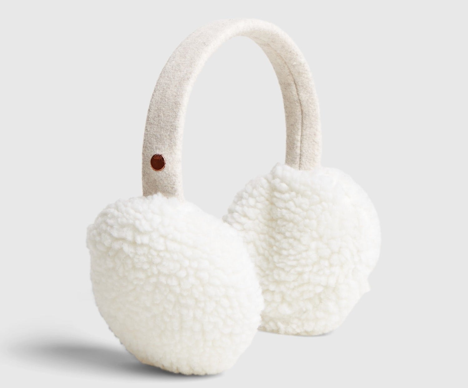 Cream earmuffs on white background