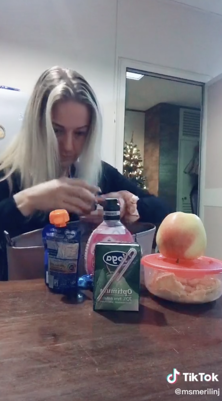 Mom pulling tons of snacks and leftover out of her purse.