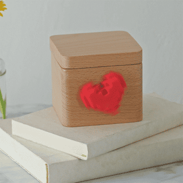 The box with a spinning 8-bit heart on the front