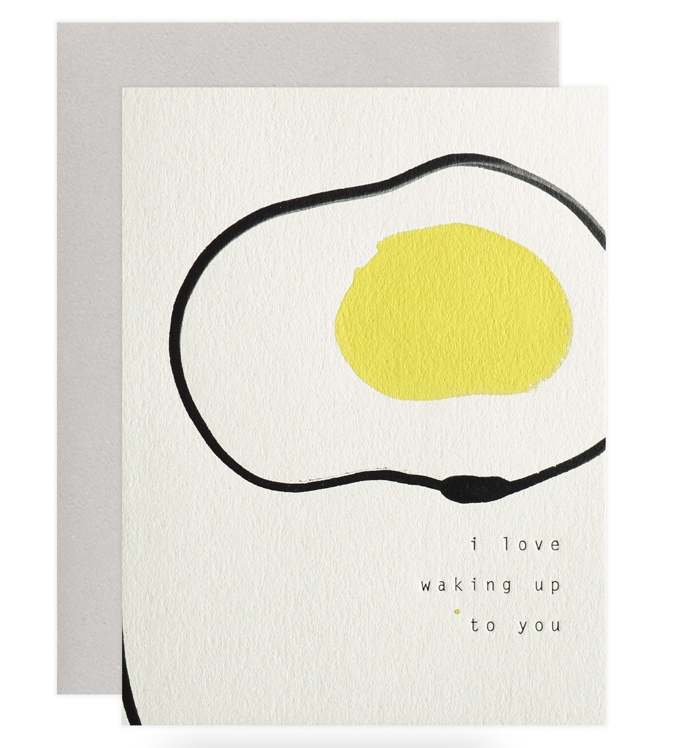 A white card with an egg drawing and the text, &quot;I love waking up to you&quot;