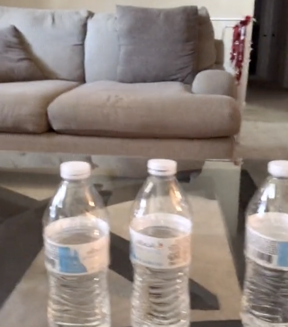 Half empty water bottles.