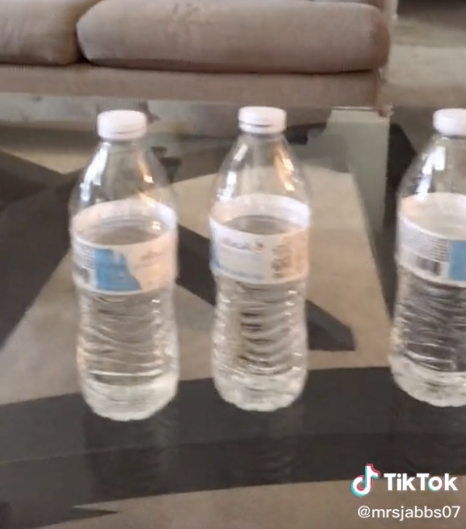 Half empty water bottles.