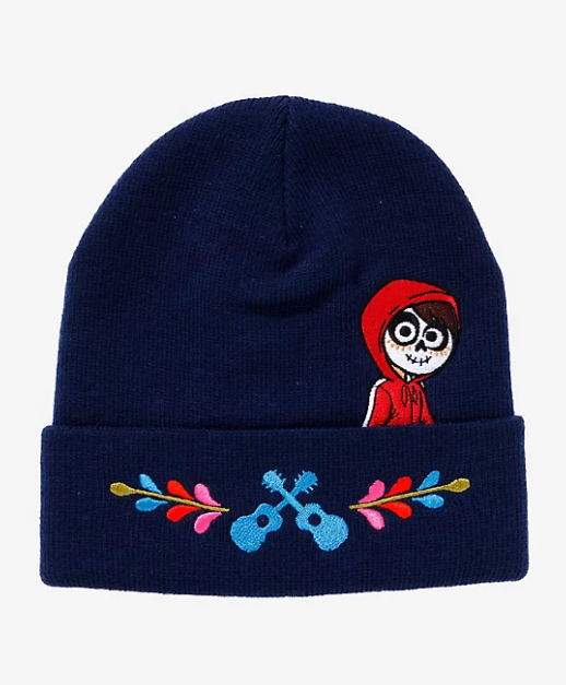 A navy beanie with Miguel on it