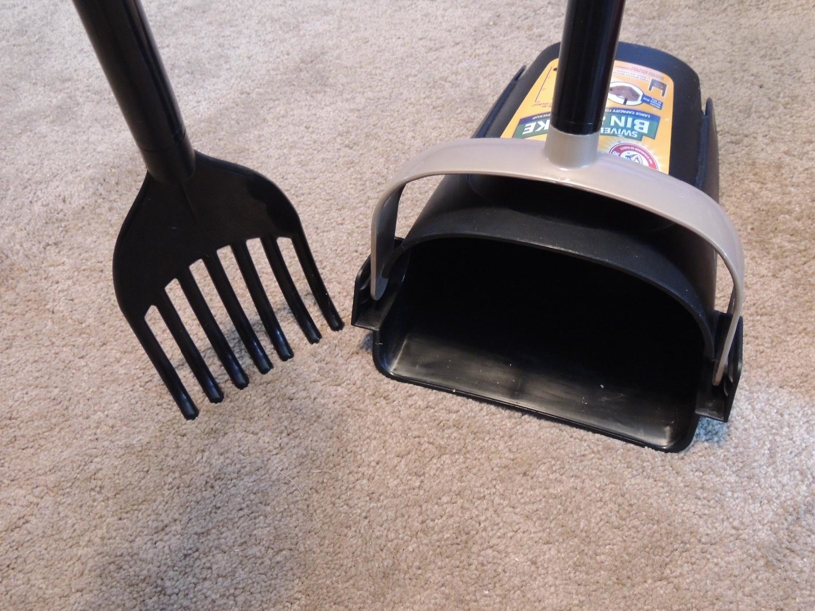 The rake and the bin, both of which are mounted on long handles