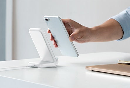 The charging stand in white