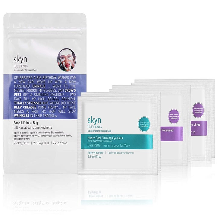 Skyn Iceland Facelift In a Bag pouch next to six packets of masks 