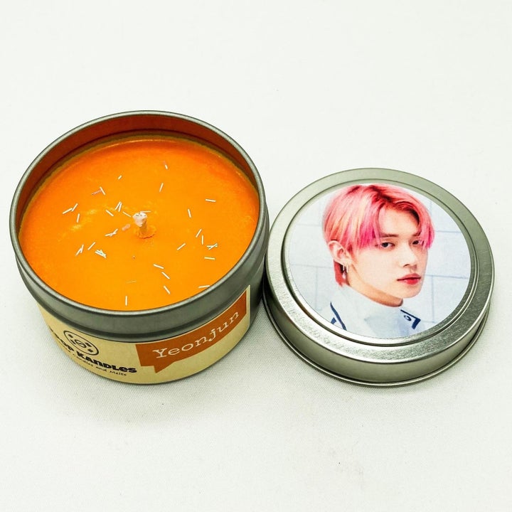 the orange Yeonjun candle 