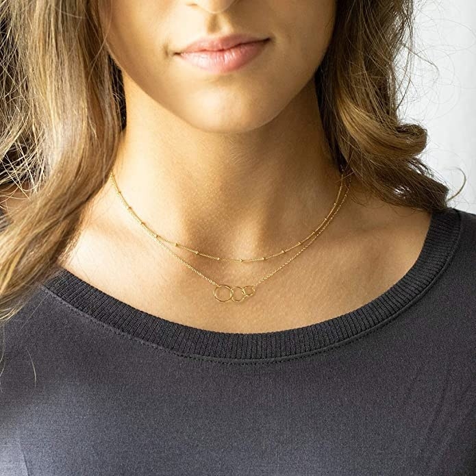 model wearing the layered necklace