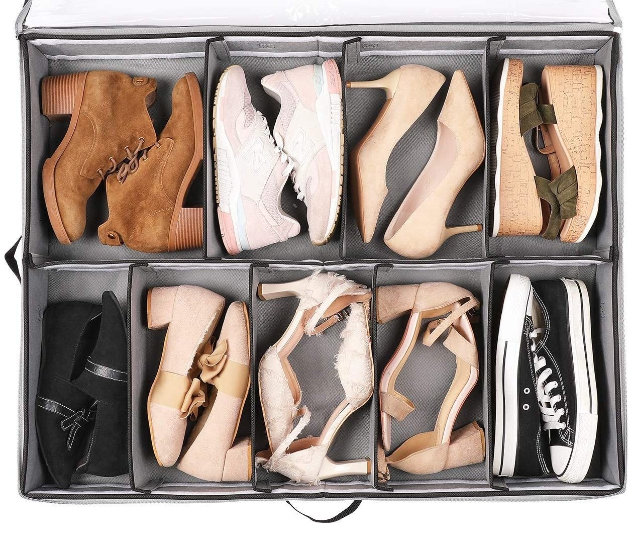 A large fabric bin with nine pairs of shoes organized inside