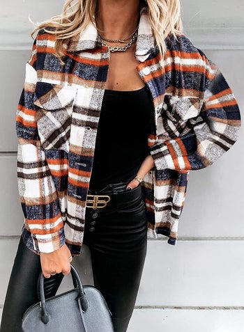 a model wearing the B Blue plaid shirt