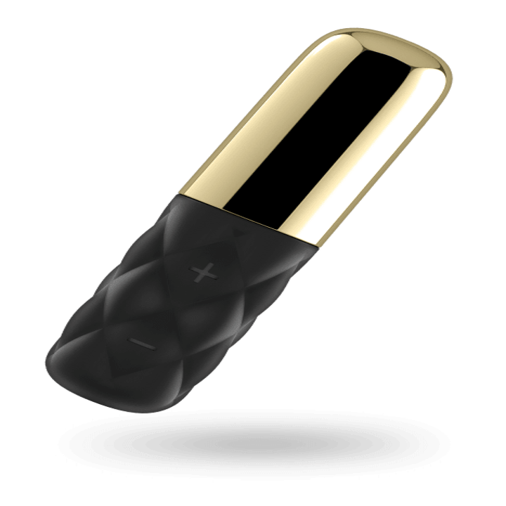 A small vibrator shaped like a tube of lipstick with a metallic gold cap and a textured silicone bottom 