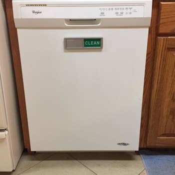 Reviewer dishwasher with clean sign revealed