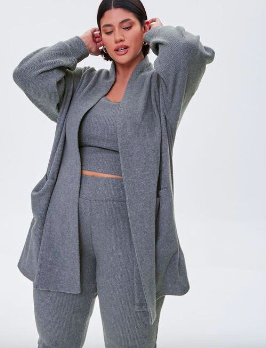 A model wearing the cardigan in charcoal