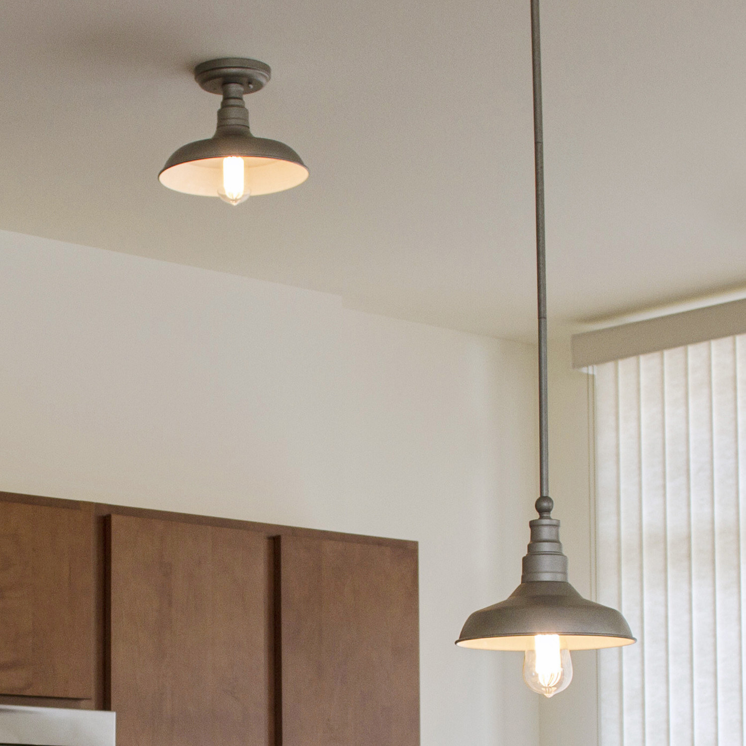 The tin light hanging at different lengths