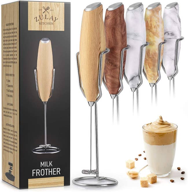 The milk frother which comes in different wood and stone finishes
