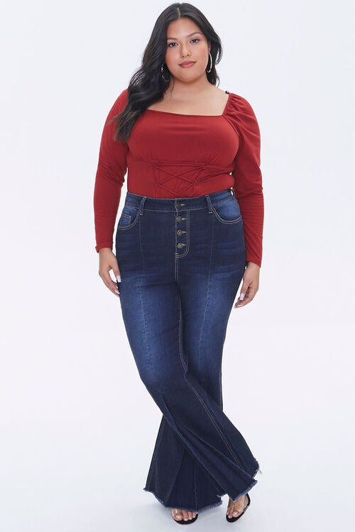 Model wearing flared denim jeans