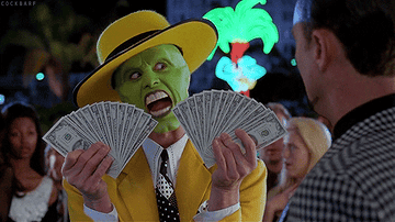Jim Carrey in The Mask holding fanned-out cash in both hands