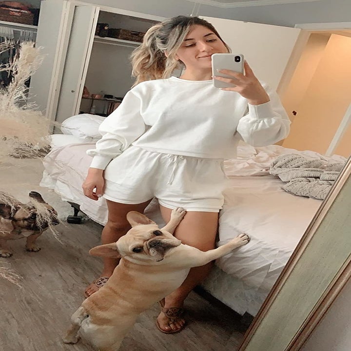 A reviewer's photo of them wearing the set in white