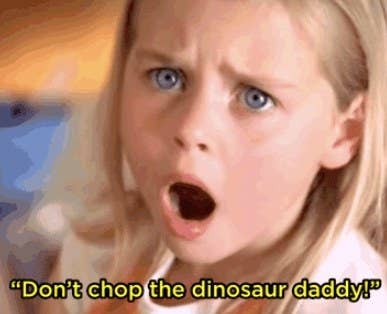 A little girl looks horrified; the caption reads &quot;don&#x27;t chop the dinosaur daddy!&quot;