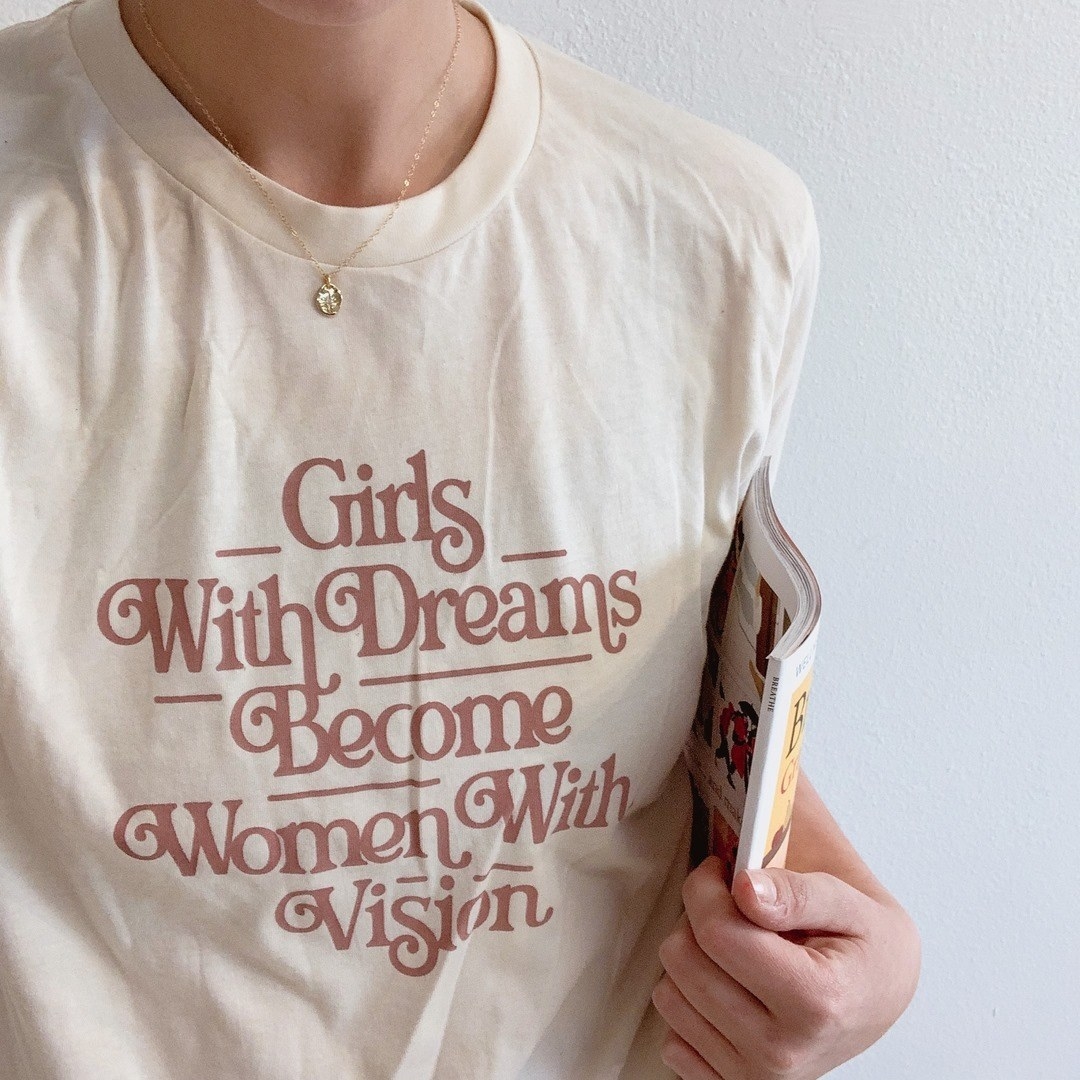 girls with dreams become women with vision graphic tee