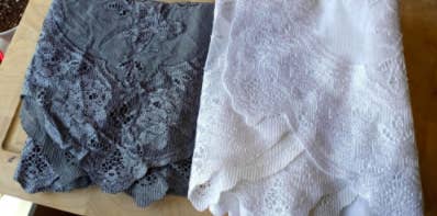 reviewer pic of a dark gray dyed lace curtain beside another white lace curtain that isn&#x27;t dyed