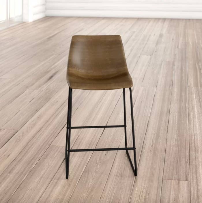 The bar stools in brown