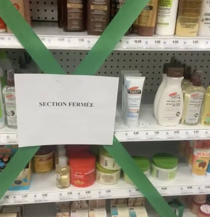 A shelf of products for Black haircare at a Uniprix store with a sign saying the section is closed