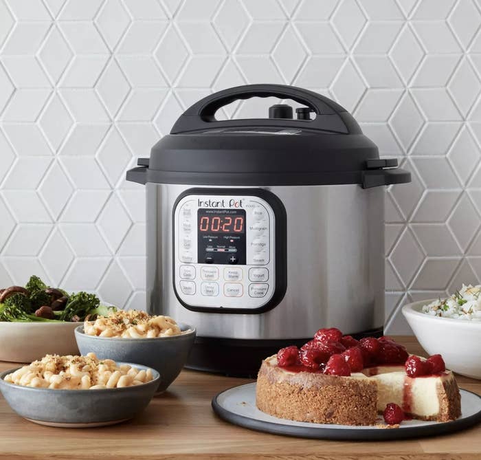 The Instant Pot surrounded by food dishes