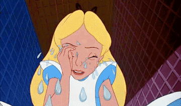 a gif of alice from alice in wonderland cry