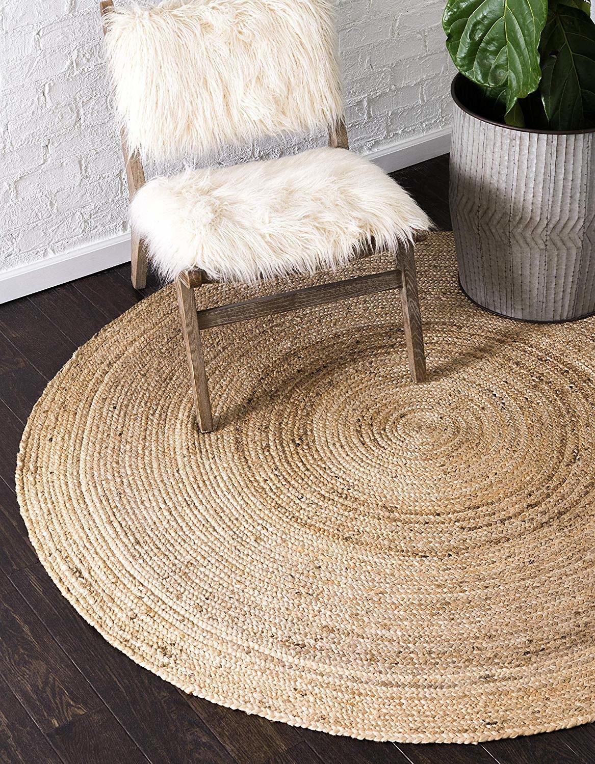 A jute rug on the floor under a chair