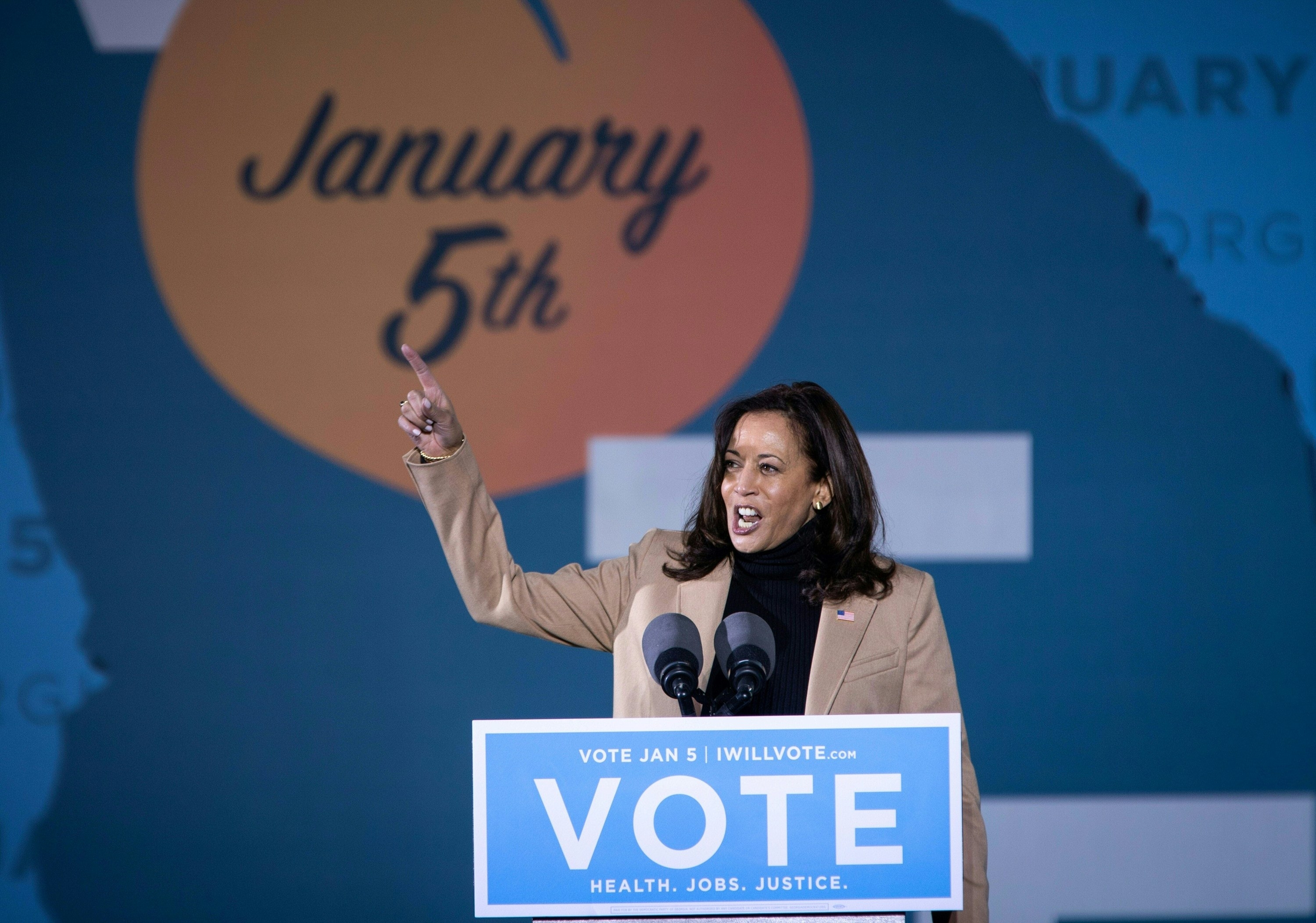 US Vice President-Elect Kamala Harris speaks at a rally in support of Democratic US Senate candidates, Reverend Raphael Warnock and Jon Ossoff
