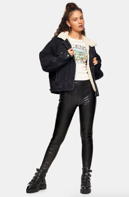 A model wearing the Sara Faux Leather Skinny Pants
