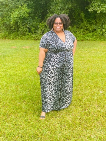 a different reviewer wearing the dress in black and grey cheetah print