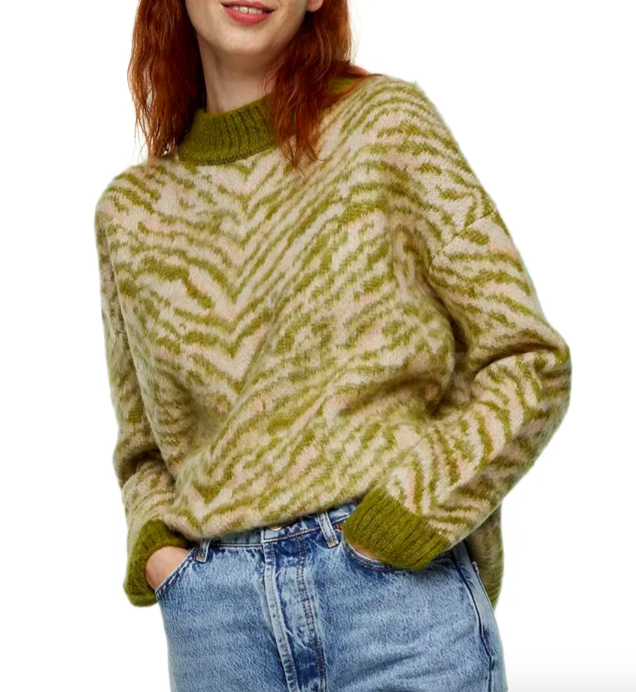 A model wearing the Tiger Stripe Sweater